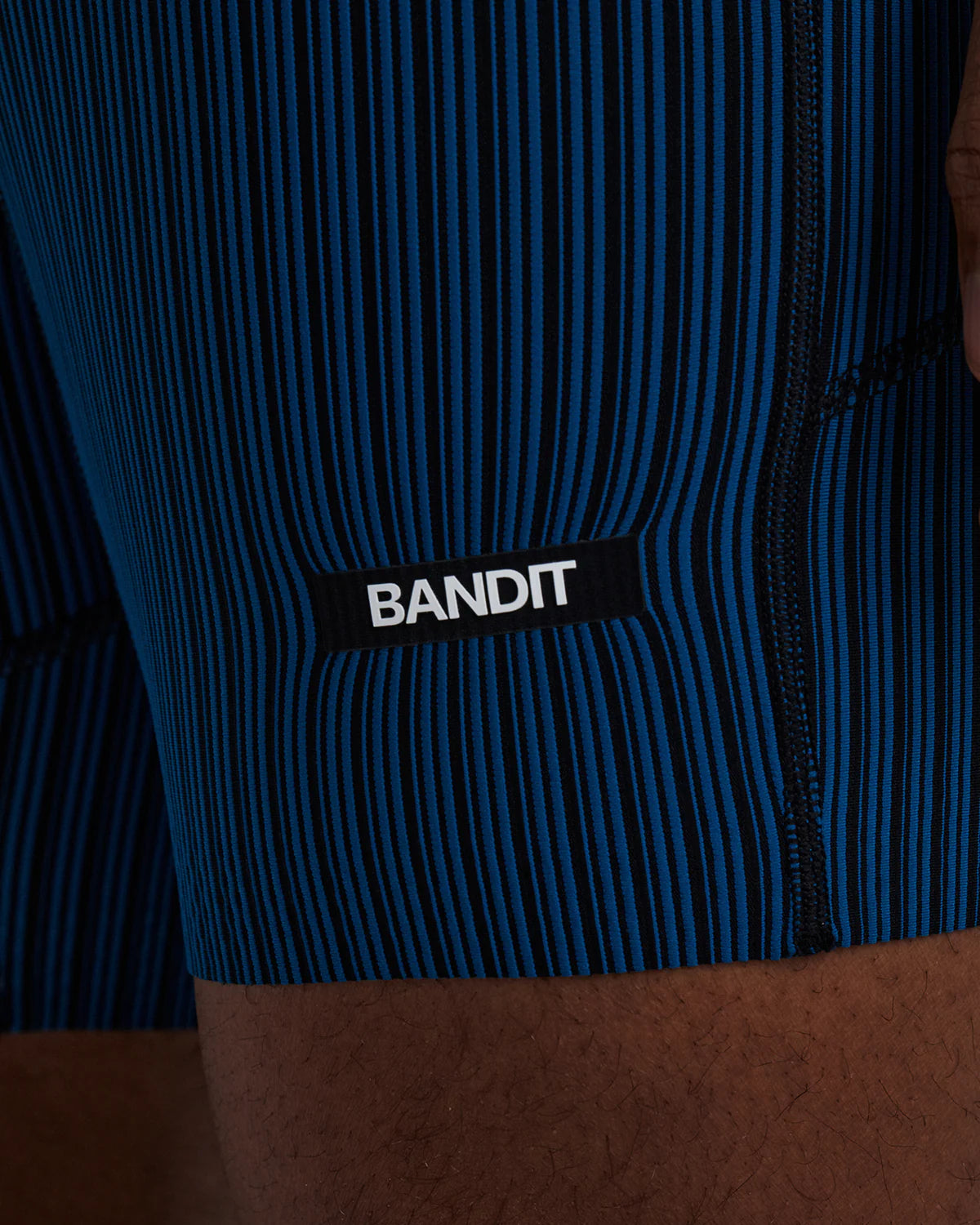 Bandit Running Men's Striped Cadence™ 7 Pocket Lined Quarter Tights - Ink Blue / Black