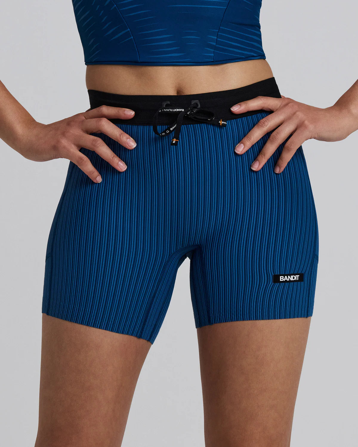 Bandit Running Women's Striped Cadence™ 5" Compression Shorts - Ink Blue / Aegean
