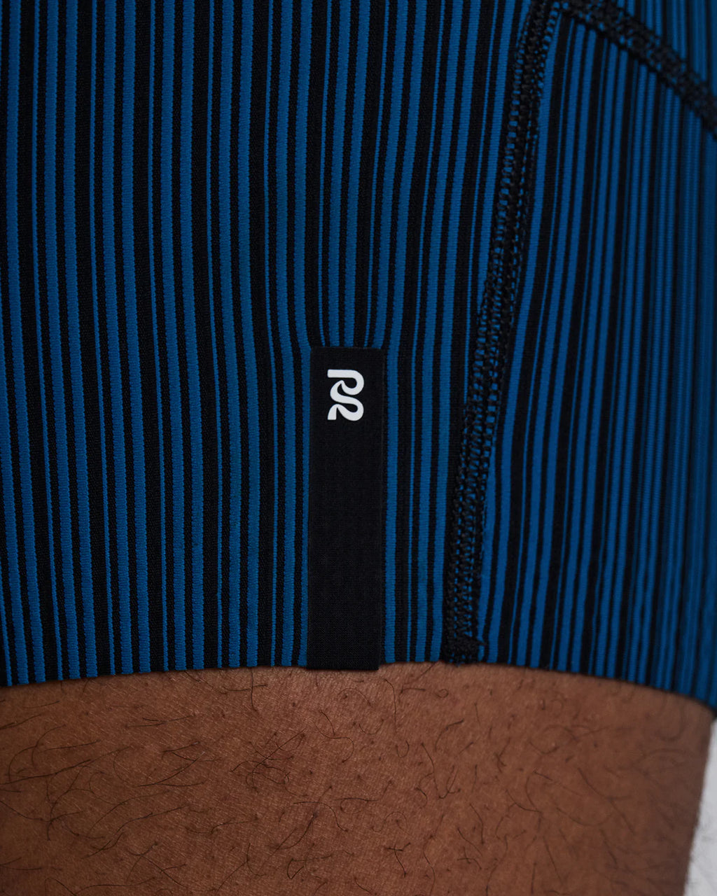 Bandit Running Men's Striped Cadence™ 7 Pocket Lined Quarter Tights - Ink Blue / Black