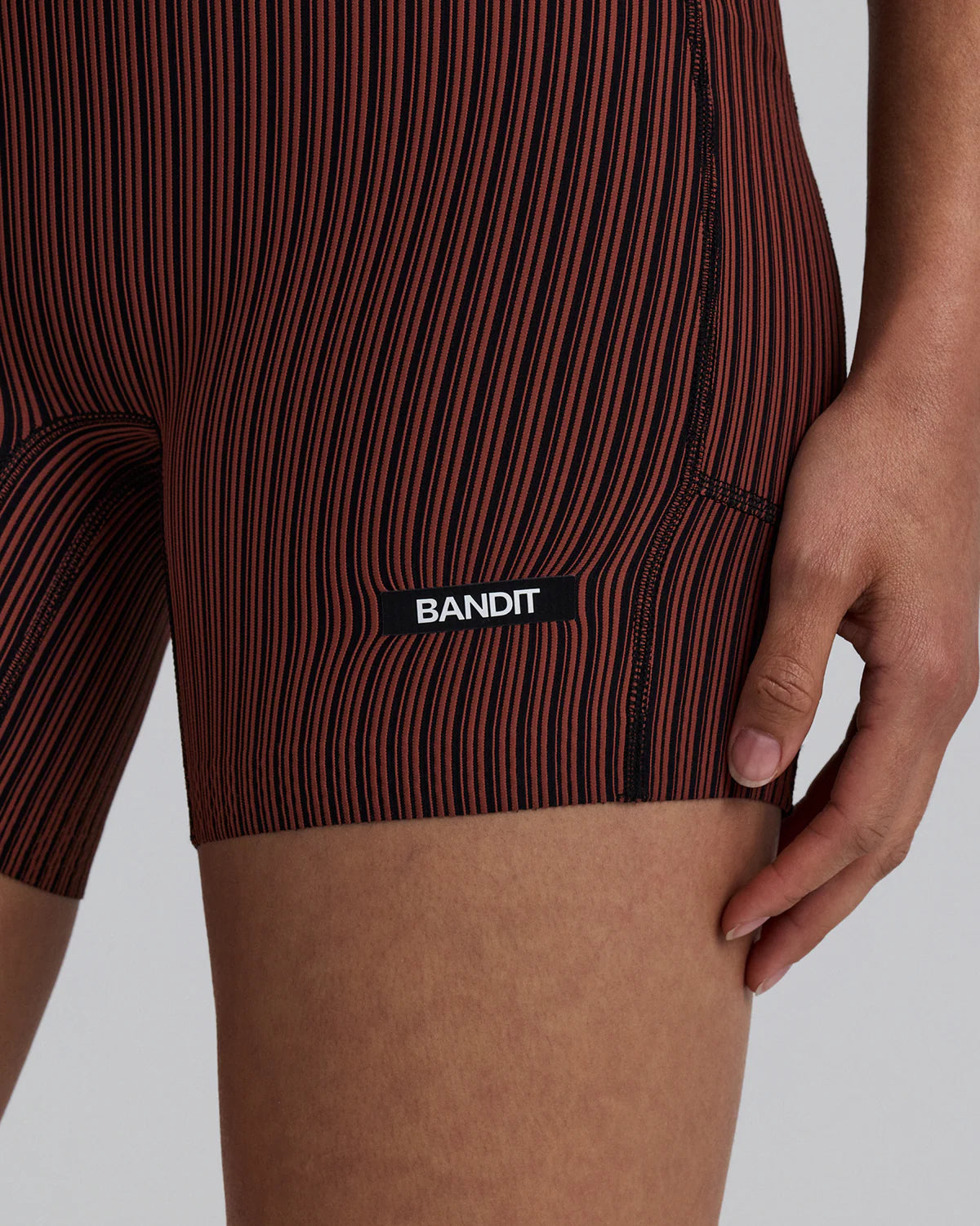 Bandit Running Women's Striped Cadence™ 5" Compression Shorts - Mahogany / Black