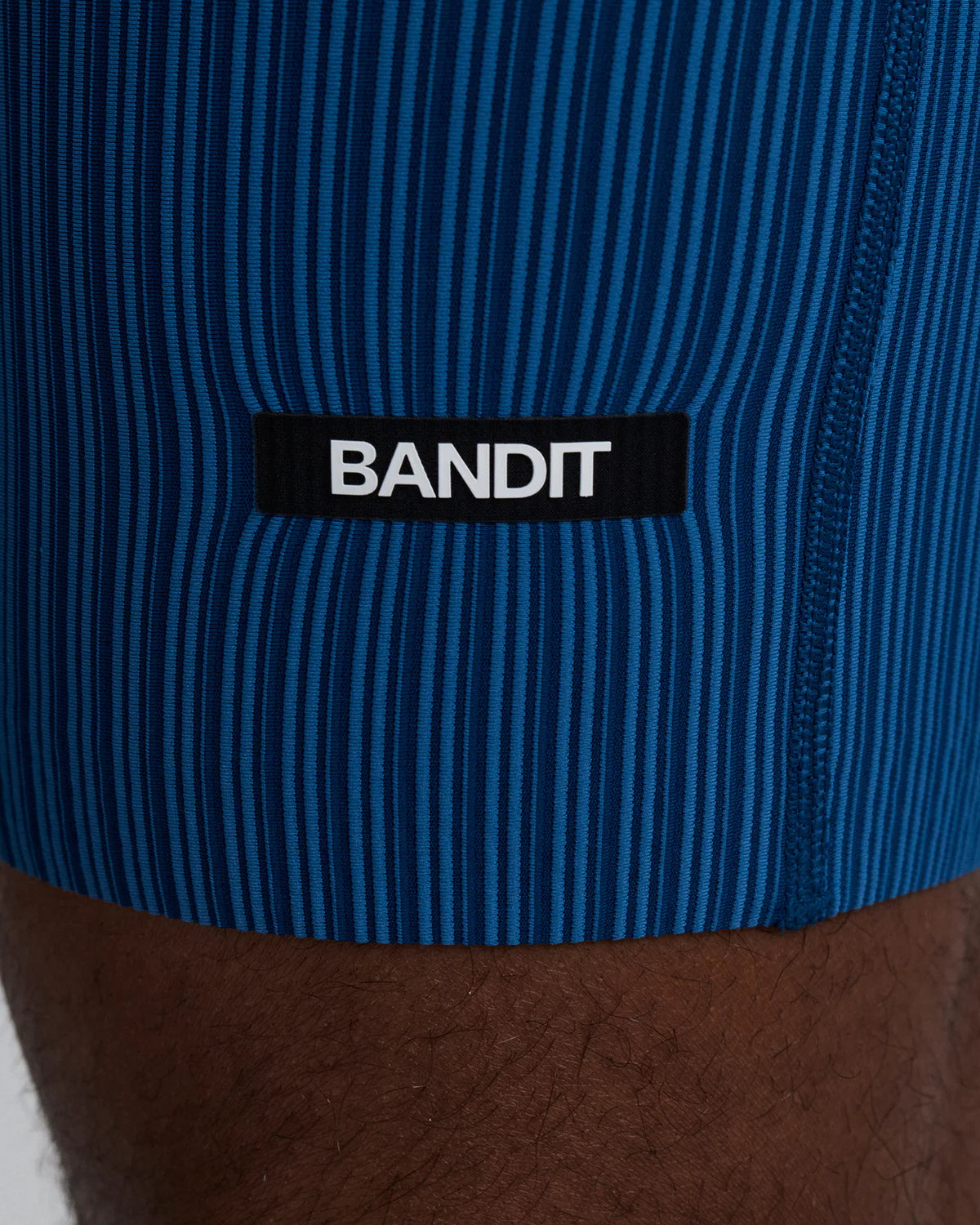 Bandit Running Men's Striped Cadence™ 7 Pocket Lined Half Tights - Ink Blue / Aegean