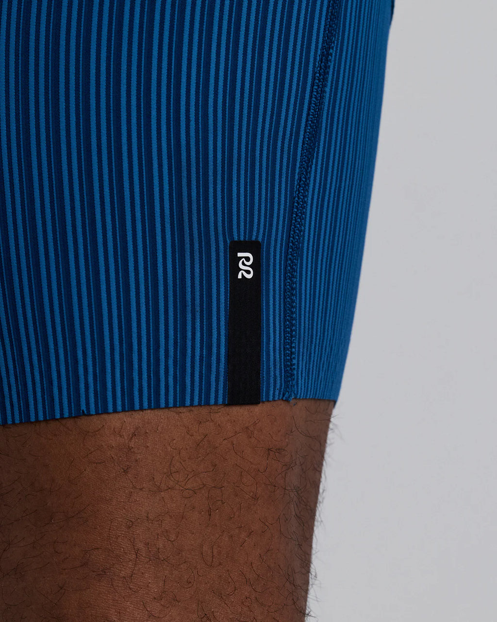 Bandit Running Men's Striped Cadence™ 7 Pocket Lined Half Tights - Ink Blue / Aegean