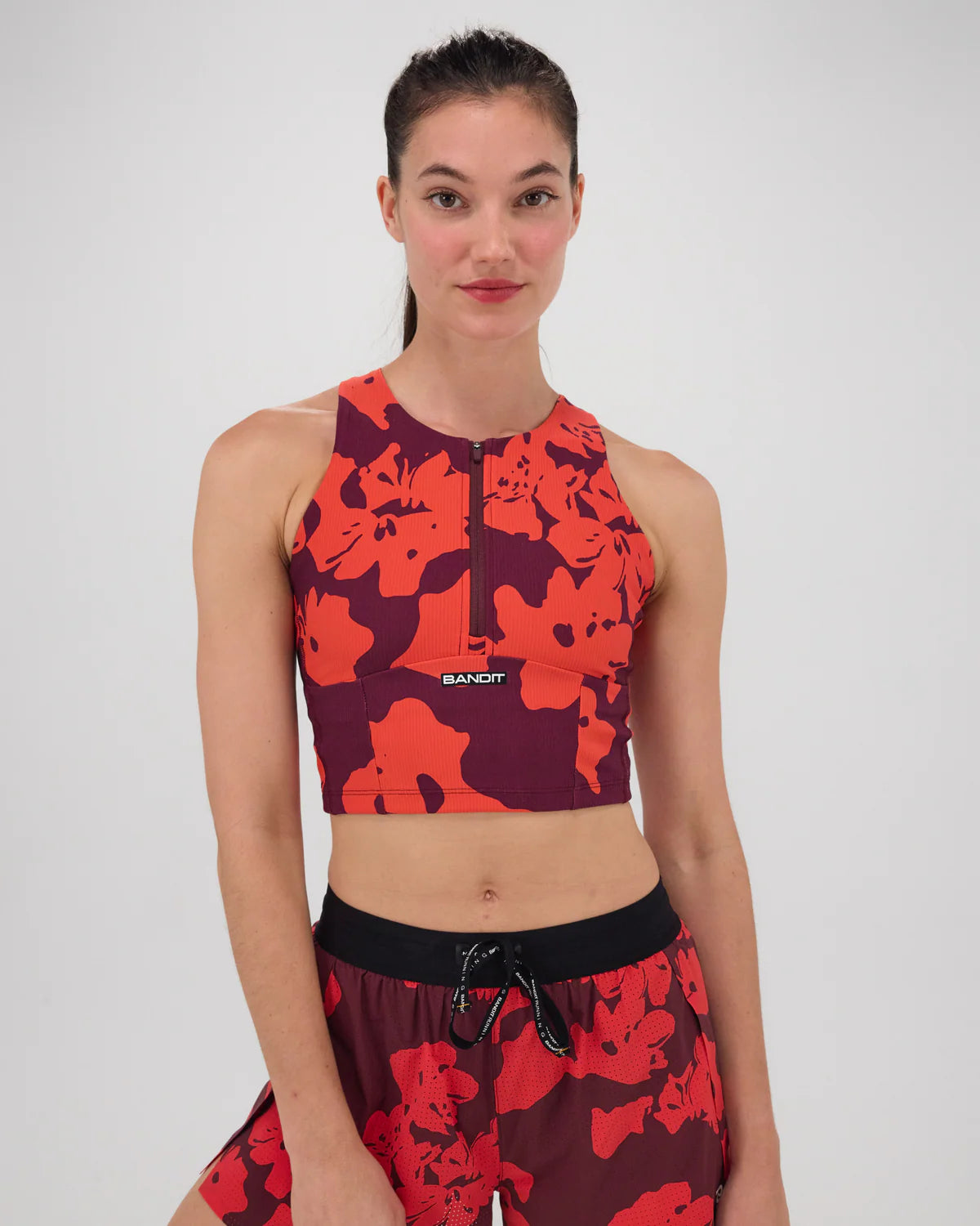 Bandit Running Cadence™ Zip Front Race Crop - Fleura, Fig / Intense Red