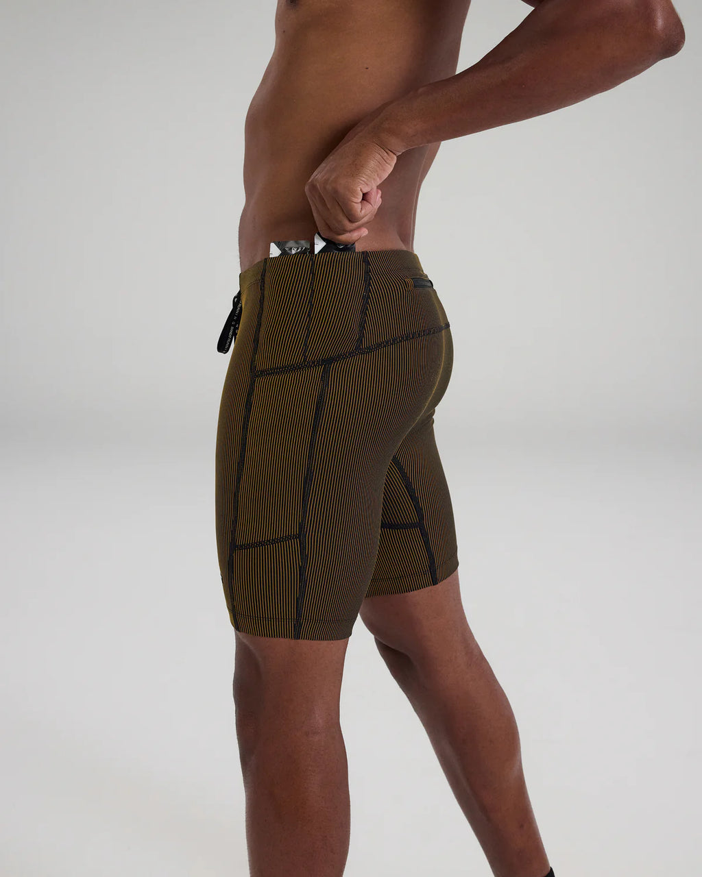 Bandit Running Striped Cadence™ 7 Pocket Half Tights - Black / Dijon