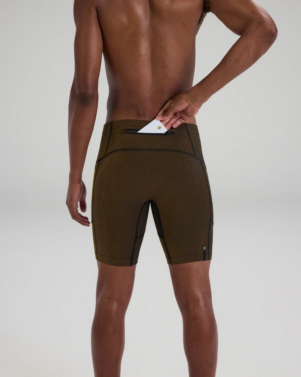 Bandit Running Striped Cadence™ 7 Pocket Half Tights - Black / Dijon