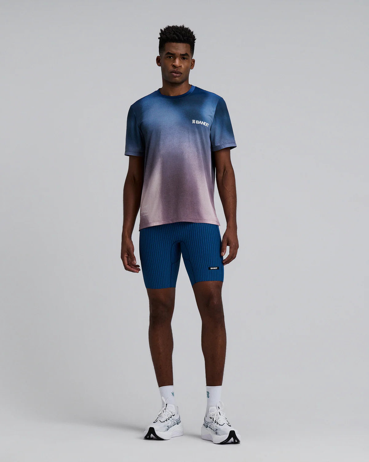 Bandit Running Men's Striped Cadence™ 7 Pocket Lined Half Tights - Ink Blue / Aegean