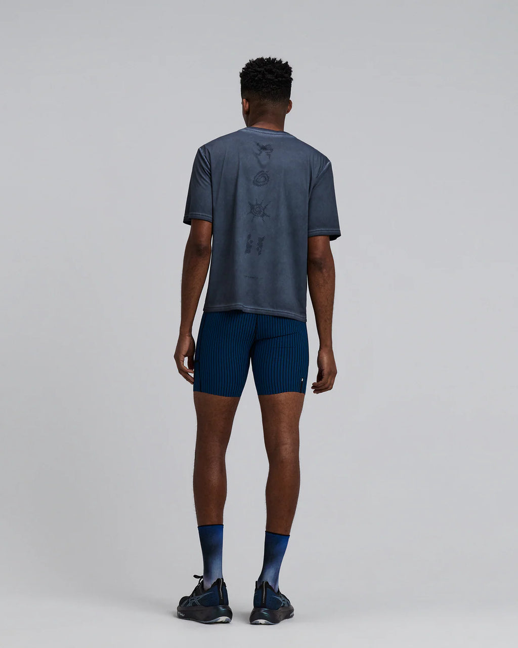 Bandit Running Men's Striped Cadence™ 7 Pocket Lined Quarter Tights - Ink Blue / Black