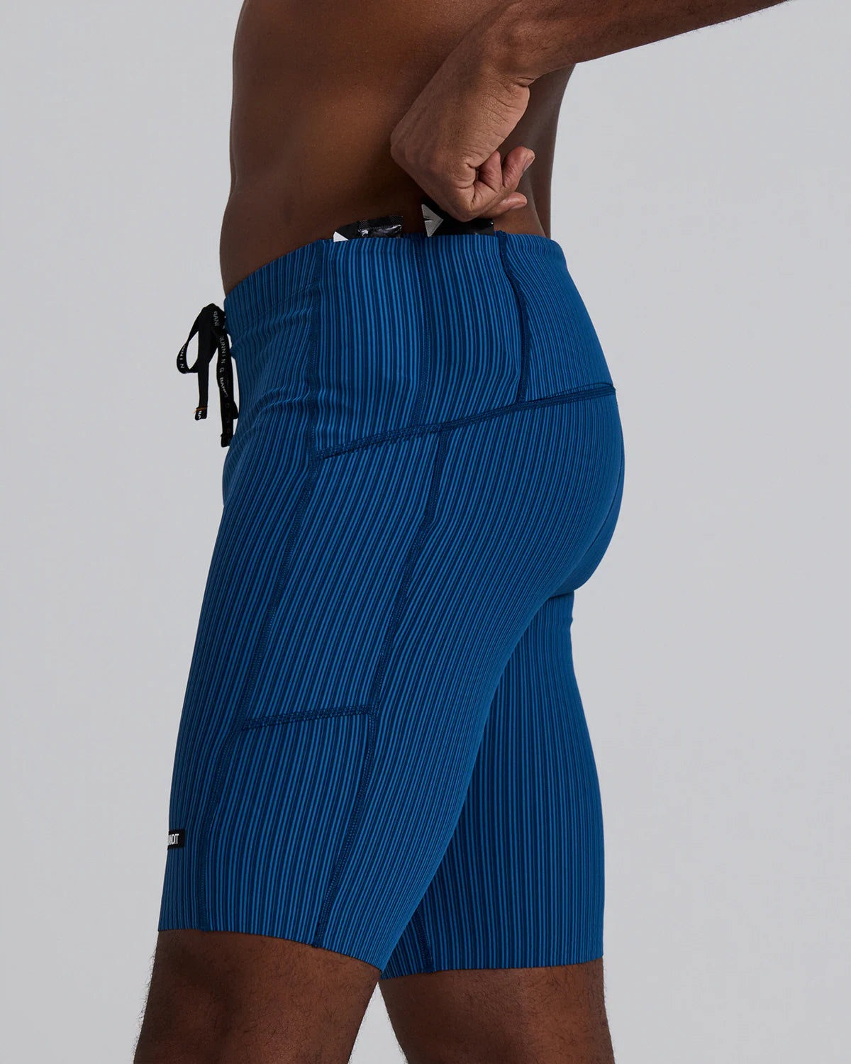 Bandit Running Men's Striped Cadence™ 7 Pocket Lined Half Tights - Ink Blue / Aegean