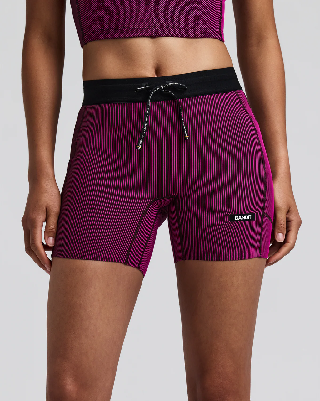 Bandit WOMEN'S STRIPED CADENCE™ 5" COMPRESSION SHORTS - ESPRESSO / AZALEA