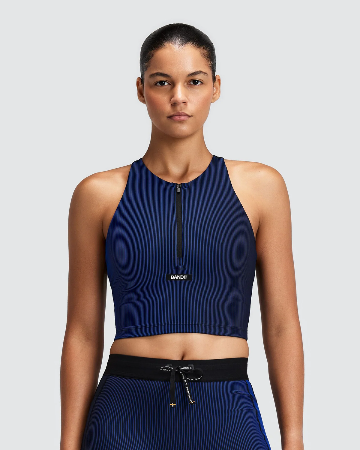 Bandit WOMEN'S STRIPED CADENCE™ ZIP FRONT T BACK RACE CROP - BLACK / BAUHAUS BLUE