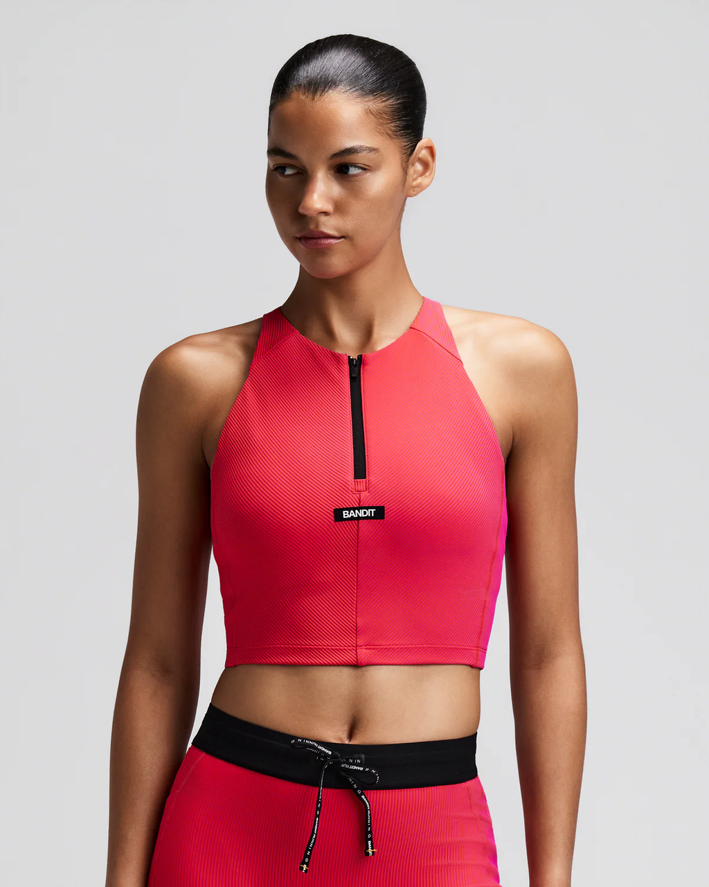 Bandit WOMEN'S STRIPED CADENCE™ ZIP FRONT RACE CROP - POPPY / AZALEA