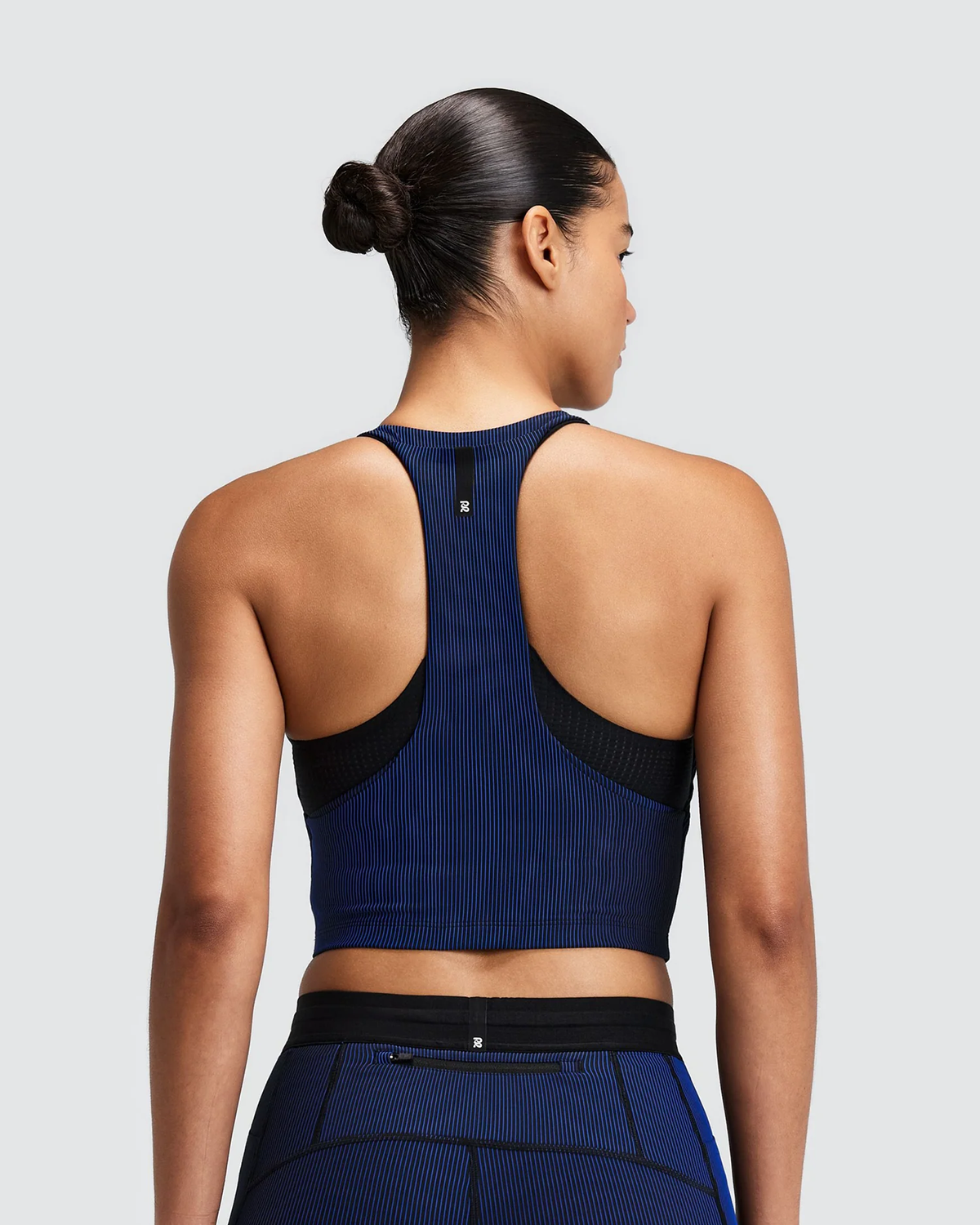 Bandit WOMEN'S STRIPED CADENCE™ ZIP FRONT T BACK RACE CROP - BLACK / BAUHAUS BLUE